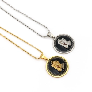 Hip hop praying hands pendants in gold and silver finish with Greek key border and iced accents