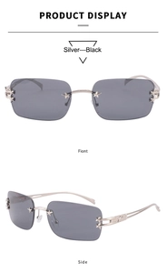Détail de lunettes de soleil rectangulaires sans monture avec rivets étoile et branches ajourées