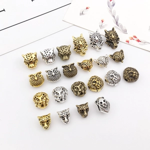 Macro di perline distanziatrici a testa di animale in lega oro argento e bronzo