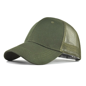 Detail of olive green trucker hat showing breathable mesh and curved visor