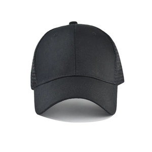 Classic black breathable cotton mesh trucker hat with minimalist solid design for outdoors