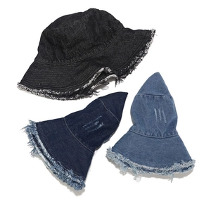 Retro distressed denim bucket hats with frayed edges in blue and black colors