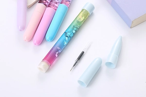 Disassembled view of creative glitter quicksand gel pen showing internal parts and colorful ink