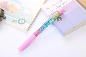 Detail of creative glitter liquid sand gel pen with pink gradient and sparkling sequins
