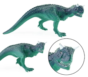 Macro detail of Carnotaurus dinosaur model toy showing realistic scales and head horns