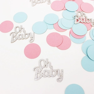 Close-up of pink, blue, and silver glitter Oh Baby confetti for baby shower party DIY