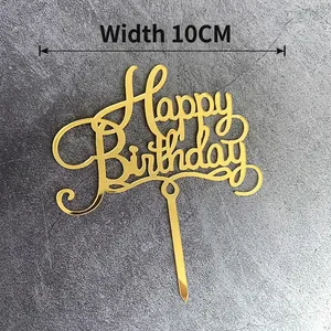 Golden acrylic Happy Birthday cake topper with mirror finish on stone background