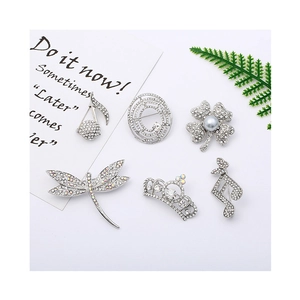 Set of six silver alloy animal and plant brooches with sparkling white rhinestones