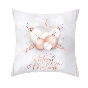 Housse de coussin Noël or rose en peau de pêche pour une décoration de fête élégante