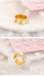 Macro detail of 18k gold plated open ring with shell inlay and micro zircon stones