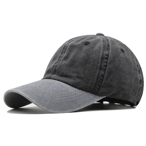 Retro washed charcoal gray baseball cap with curved brim and vintage workwear aesthetic