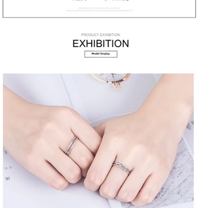 Minimalist silver rings on model hand featuring classic four-prong solitaire zircon setting