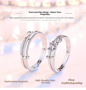Detail of silver couple rings with cubic zirconia stone and romantic light background
