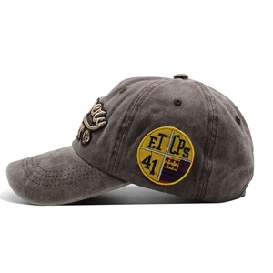 Vintage washed cotton baseball cap with yellow 3ET embroidery and distressed brim detail