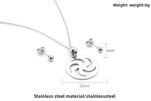 Detailed view of 6g stainless steel jewelry set with 22mm hollow disc pendant and 4mm studs