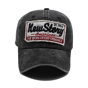 Distressed grey washed cotton baseball cap with embroidered patch and curved brim