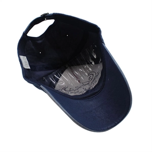 Inside view of navy cotton baseball cap showing adjustable strap and inner stitching details