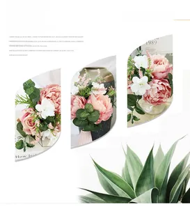 Detail of faux peony and eucalyptus floral arrangement in Nordic minimalist style