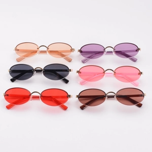 Women's vintage rimless oval sunglasses shown in six various vibrant lens colors