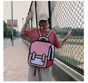 Outdoor shot of a 2D cartoon style backpack in pink and white with black outlines