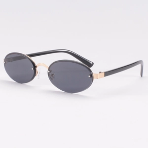 Elegant retro oval rimless sunglasses with grey lenses and gold metal bridge details