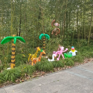 Inflatable tropical animals and palm trees set for outdoor beach party decoration