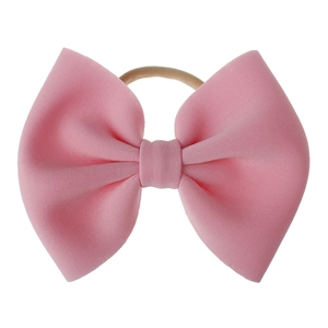 Bandeau bébé rose avec grand nœud en tissu tricoté élastique et doux au toucher