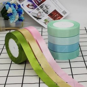Polished 2cm satin ribbons in various colors for gift wrapping and wedding decor
