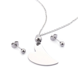 Elegant silver heart pendant necklace and matching stud earrings jewelry set on white
