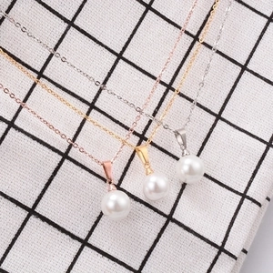 Three-color minimalist pearl pendant necklaces in rose gold, gold, and silver finishes