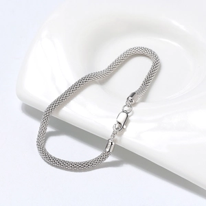 Elegant S925 sterling silver 3mm popcorn chain bracelet hanging on a white ceramic tray