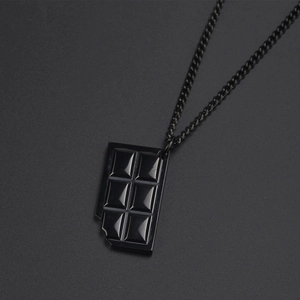 Titanium steel necklace with creative bitten chocolate pendant in polished black finish