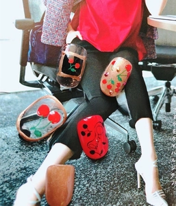 Detail of ultra-thin 3D nail stickers featuring cherry patterns and English letters