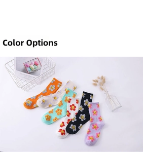 Detail of colorful cotton mid-calf socks with floral smiley face patterns in six vibrant colors