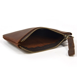 Vintage dark brown crazy horse leather coin purse with bronze zipper and top view of interior
