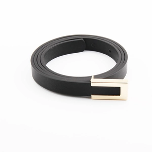 Minimalist black leather skinny belt for women with polished gold rectangular buckle