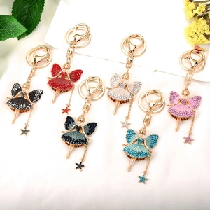 Detail of six fairy rhinestone keychains in multiple colors with gold lobster clasps