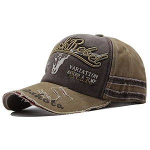 Detailed side view of vintage washed baseball cap with BlackRebel embroidery and frayed brim