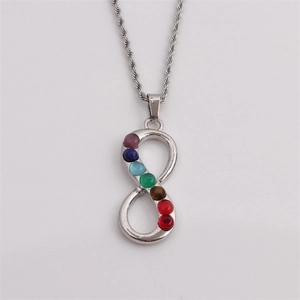 Silver infinity necklace pendant with seven colorful inlaid crystal gemstones and chain