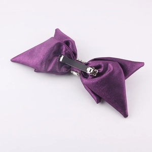 Elegant purple satin bow hair clip with luxury rhinestone accents for women's hairstyle