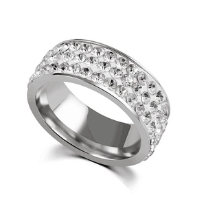 Macro shot of silver titanium steel ring with five rows of sparkling cubic zirconia