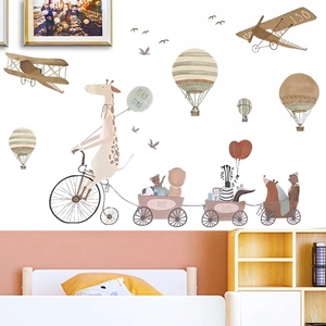 Watercolor animal wall stickers featuring giraffe on bicycle and hot air balloon decor