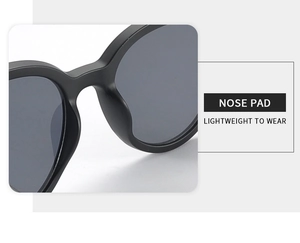 Detailed view of integrated matte black nose pads for lightweight sunglasses comfort