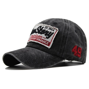 Vintage washed black baseball cap with Story patch and red 49 embroidery 45-degree angle