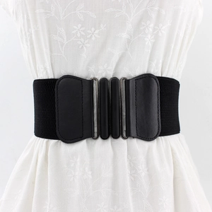 Elegant black elastic cinch belt with double oval buckle on white dress for slimming look
