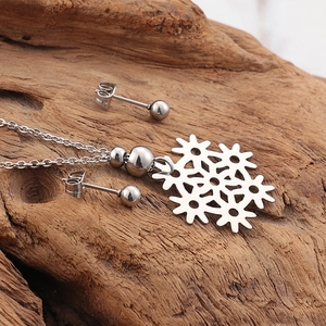 Minimalist stainless steel snowflake jewelry set with hollow pendant and stud earrings