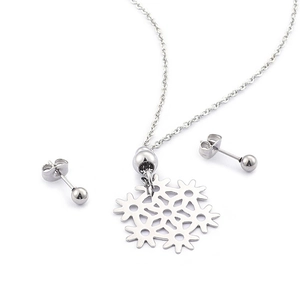 Minimalist silver snowflake jewelry set with hollow necklace and stud earrings on white