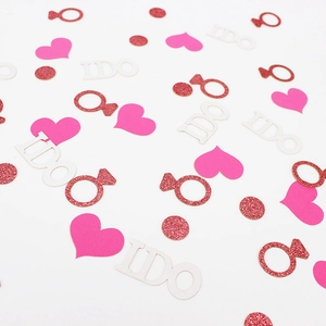 Pink and rose gold glitter I DO confetti with heart and ring shapes for wedding decor