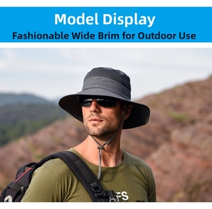 Detail of dark grey sun hat with breathable mesh and adjustable chin strap
