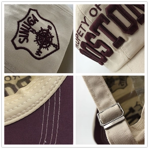 Detail showing vintage cotton baseball cap with 3D shield embroidery and metal adjustment buckle